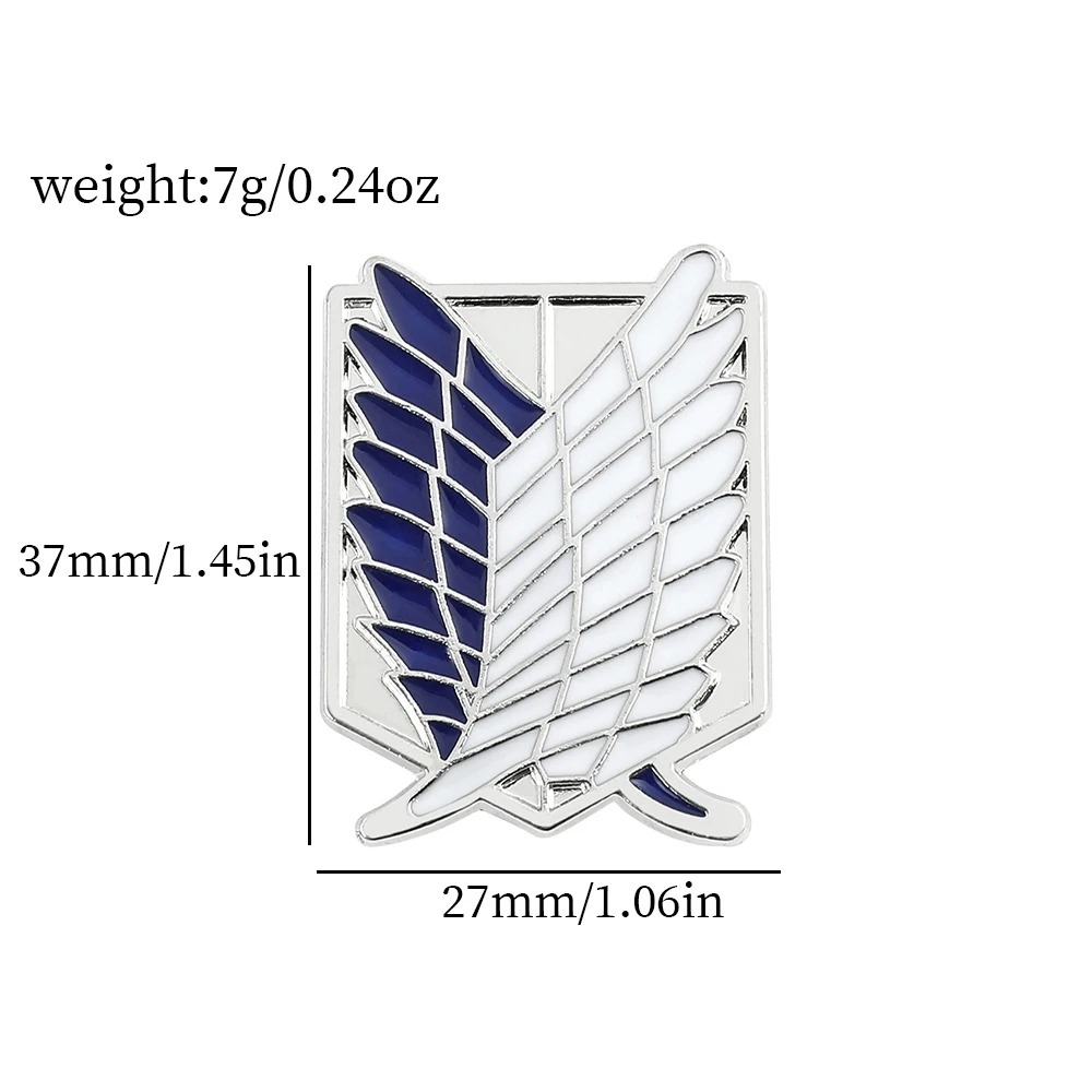 Medidas do broche das Asas da Liberdade: 37 mm de altura por 27 mm de largura, 7 gramas