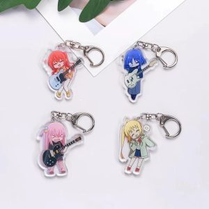 Quatro chaveiros acrílicos de Bocchi the Rock! em arte chibi, cada um com guitarra