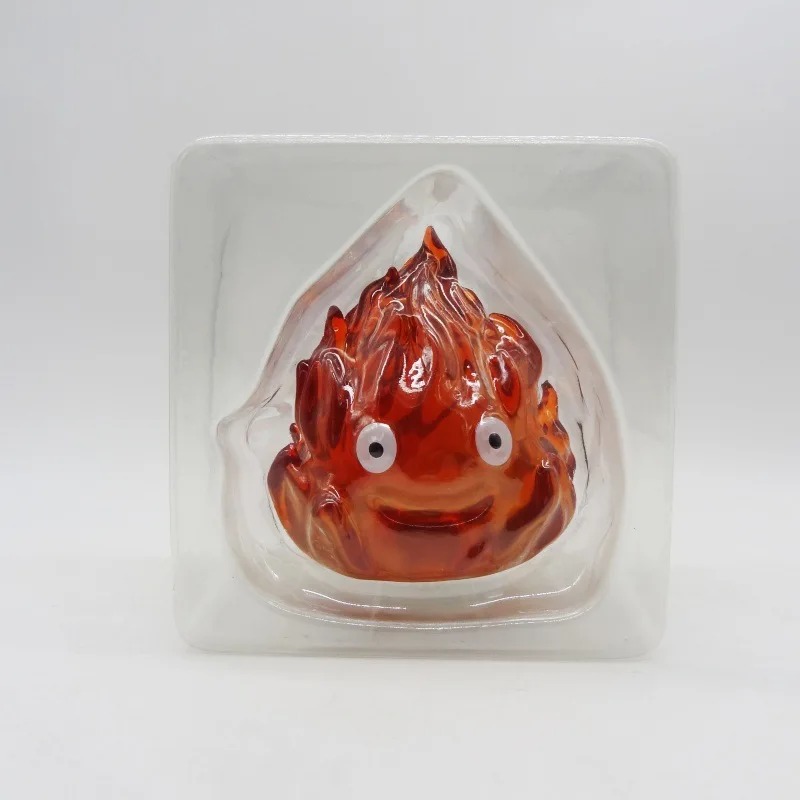 Figure do Calcifer, de O Castelo Animado, dentro do blister transparente da embalagem