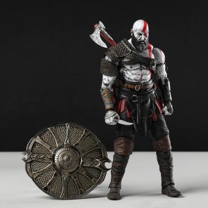 Figure do Kratos, de God of War, com machado nas costas e escudo de metal ao lado
