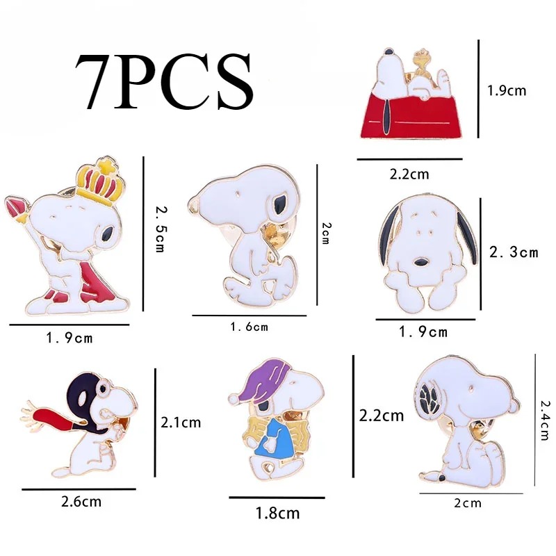 Sete broches do Snoopy com as medidas de cada peça, de 1,6 a 2,6 centímetros