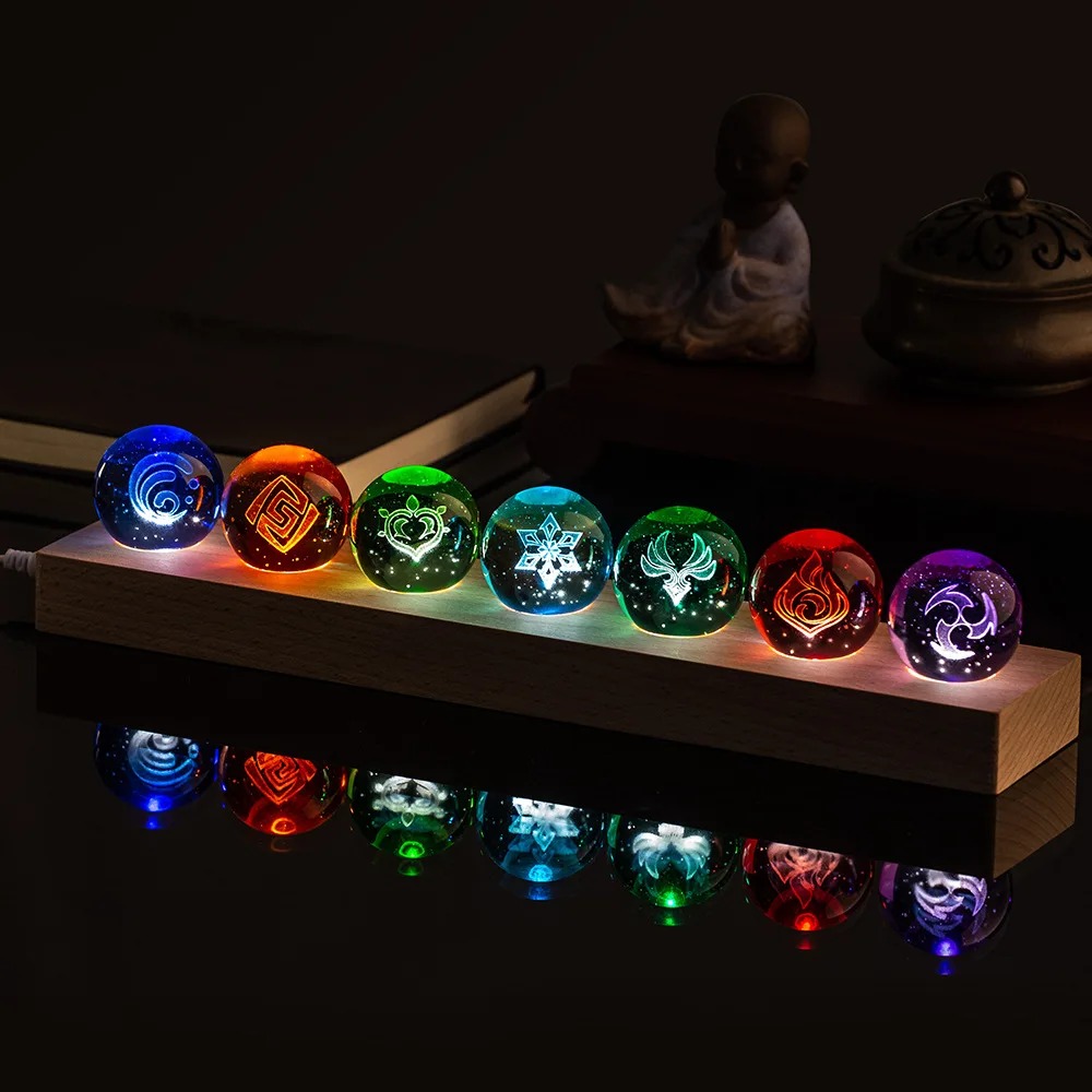 Fileira de bolas de cristal luminosas com os símbolos dos elementos de Genshin Impact