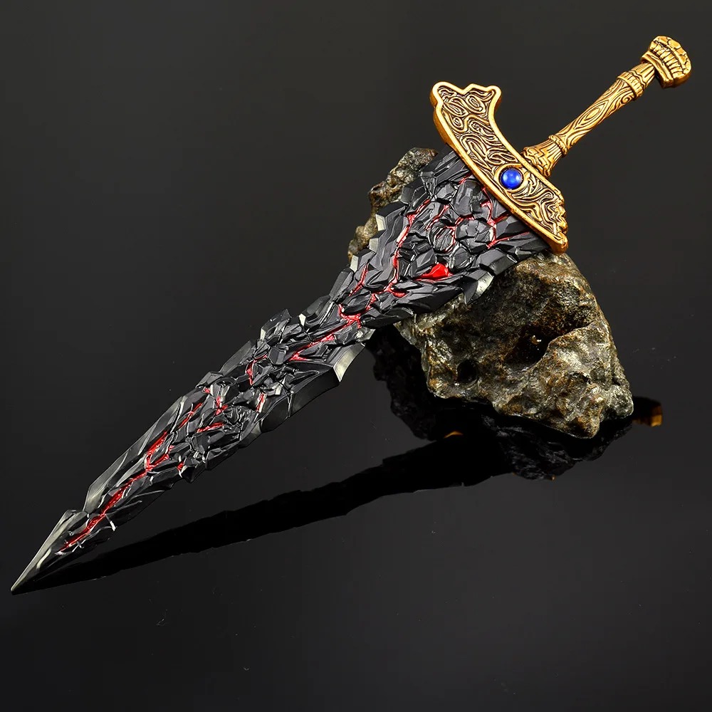 Miniatura da espada de Maliketh, de Elden Ring, mostrando o cabo dourado com pedra azul