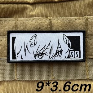 Patch retangular com os olhos da Rei Ayanami, de Evangelion, em preto e branco, com medida 9 x 3,6 cm