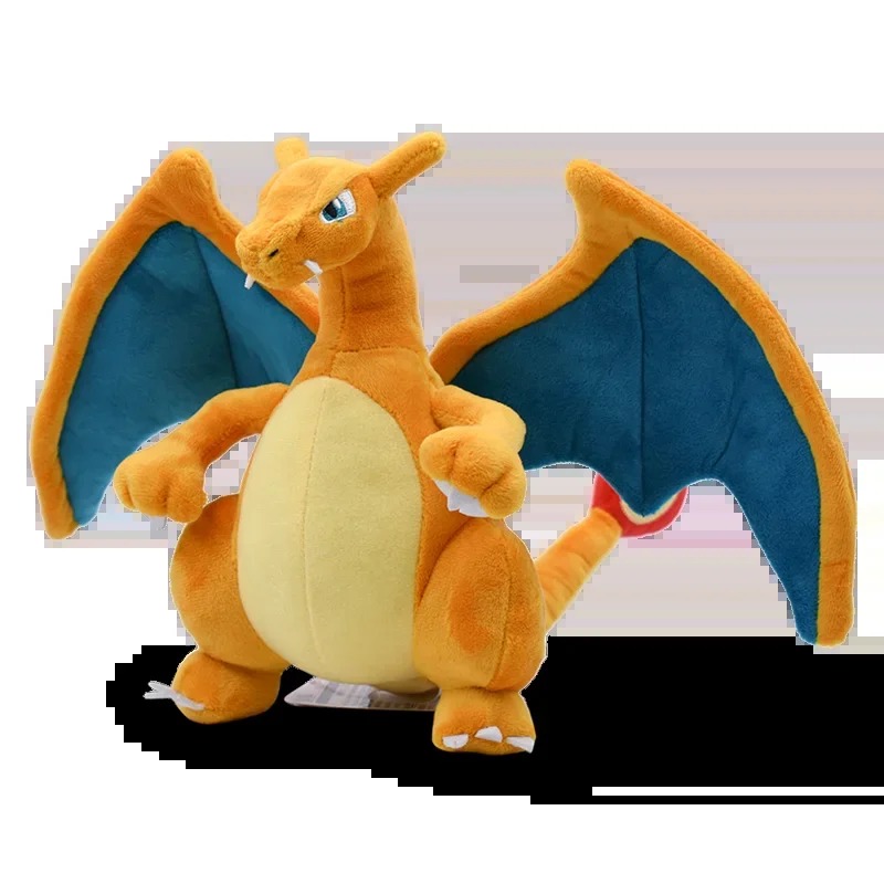 Pelúcia do Charizard, de Pokémon, de frente com asas azul-petróleo abertas