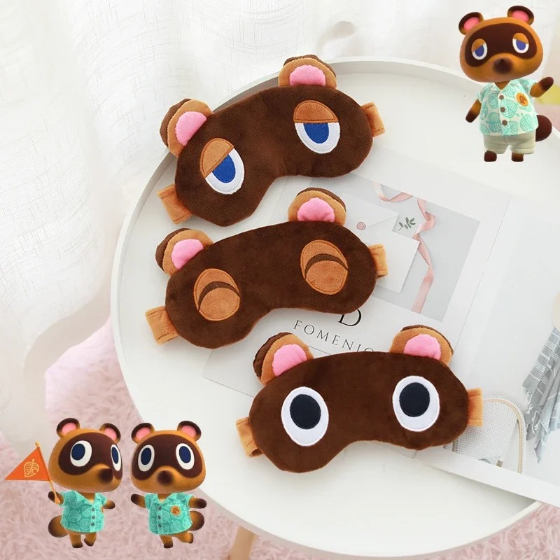 Três tapa-olhos do Tom Nook, de Animal Crossing, com expressões diferentes sobre um prato branco