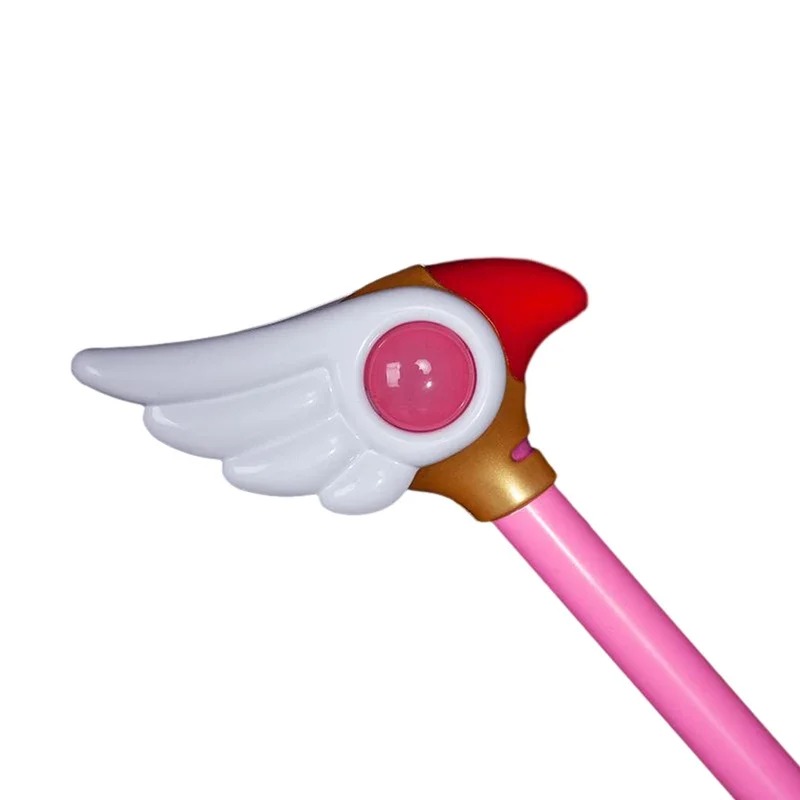Detalhe das asas brancas e da esfera vermelha da varinha da Sakura Kinomoto